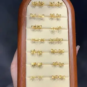 أقراط بريمة على شكل فيونكة مطلية بالذهب عيار 18 قيراطًا مُصممة من خليط معدني مخصص على النمط الكلاسيكي العصري من الألماس مع حجر الزركون لحفلات السيدات والرجال