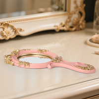 Miroir de maquillage à main en métal rose gaufré ovale européen de luxe Miroir à main cosmétique de voyage princesse vintage avec poignée