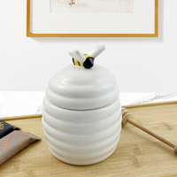 Vente en gros de produits spécialisés pour la cuisine Boîte à peinture à la main de qualité alimentaire Pot de stockage de miel vintage récipient en céramique avec couvercle