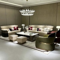 Ensemble de canapés en cuir véritable de style italien, luxe léger, en forme de U, avec design à dossier haut démontable et personnalisable pour l'ameublement de la maison