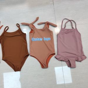 <span class=keywords><strong>Maillot</strong></span> <span class=keywords><strong>de</strong></span> <span class=keywords><strong>bain</strong></span> une pièce écologique en tissu recyclé pour bébés filles, taille haute, fermeture éclair, décorations à volants, logo frontal, couleur unie, vente en gros - Product Image 1