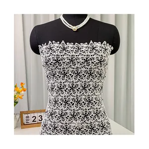 Düşük fiyat fransız vual dokuma suda çözünür dantel kumaş beyaz ve siyah kadınlar için en kaliteli nakış kumaş elbise özel 2024