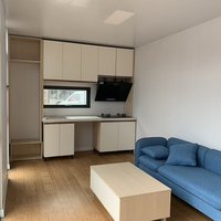Moderne module préfabriqués pliage maisons préfabriquées panneaux sandwich en laine de roche de construction conteneur d'expédition maison d'été avec le caca