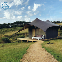 Tentes de glamping en toile PVC avec salle de bain privée et grand balcon pour l'hébergement en safari africain