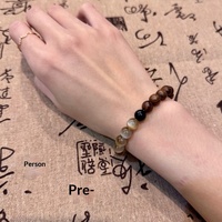 Bestverkochte Green Mountain natuurlijke zwarte palissander kattenoog kralenarmband etnisch unisex cadeau origineel ontwerp Xiaohongshu