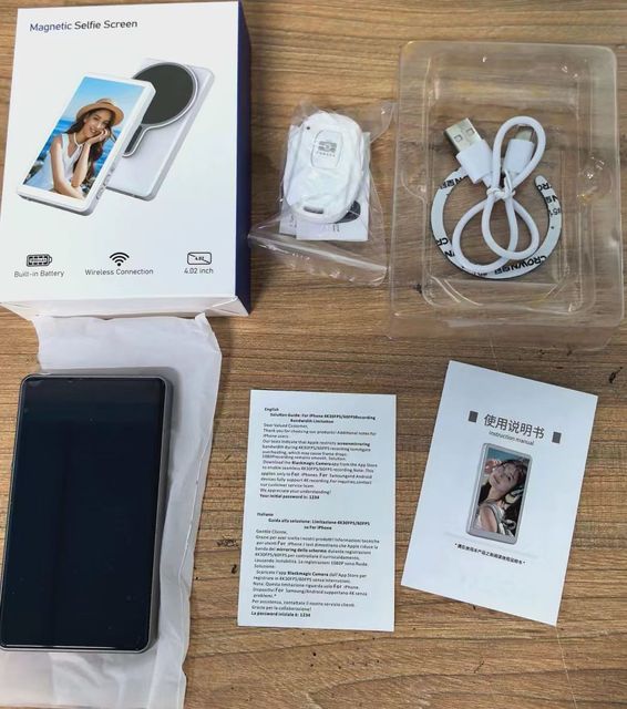 X40 Mobile Phone Has a Selfie Screen-sharing Device and a Rear-facing Live-streaming Magnetic Projection Screen Device.