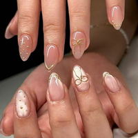 Faux ongles à presser en amande, style français, avec nœud et strass brillants, motifs floraux et pois