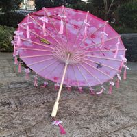 Style chinois Soie Décoratif Paraguas Performance Photographique Danse Parasol À La Main Huilé Papier Parapluie avec Glands