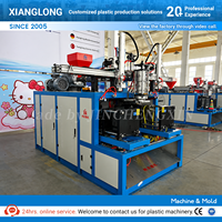 Machine de soufflage électrique semi-automatique à double station pour la fabrication de jouets en plastique en forme de pêche