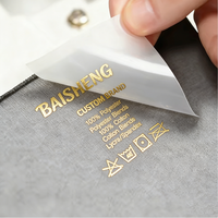 Étiquettes de vêtements personnalisées avec logo en feuille d'or, transfert thermique, symboles d'entretien, pour t-shirts, sacs, chaussures, marqueurs de taille, vente en gros pour agents
