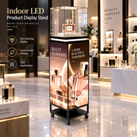 Présentoir numérique LED de luxe pour intérieur avec vitrine en verre illuminée et écran publicitaire personnalisé pour les boutiques de parfums