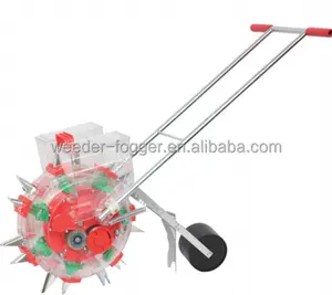 Hot-selling hand-push domestic small-sized corn, soybean and peanut seeder adjustable vegetable planter