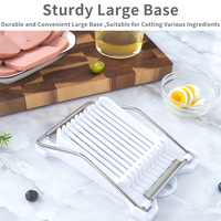Outil de cuisine manuel durable en acier inoxydable à grande base anti-dérapante pour les œufs durs à usages multiples