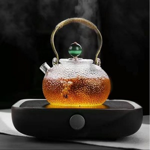 Tetera de vidrio martillado con mango de cobre, resistente a altas temperaturas, juego de té Kung Fu, forma redonda, para té de la tarde - Product Image 1