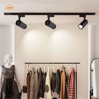 Spot LED COB 30W moderne réglable en aluminium pour rail de plafond, idéal pour les magasins de vêtements et les espaces commerciaux
