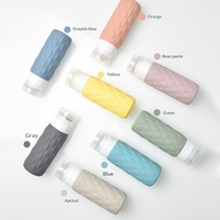Bouteilles de voyage texturées rechargeables en silicone de qualité alimentaire, type compressible, capacité 100 ml, lot de 4 pour cosmétiques et gel douche