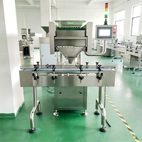 Machine de comptage et d'embouteillage entièrement automatique pour comprimés, bonbons, capsules, gélules, aliments pour animaux de compagnie et compléments alimentaires