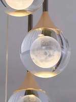 Petit lustre suspendu LED en acier inoxydable doré avec cristal gravé en forme de lune pour villa, loft, duplex, salon, simple et luxueux