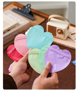 Sacs à bijoux biodégradables en PVC couleur macaron, personnalisés en forme de cœur avec fermeture éclair, pour boucles d'oreilles, bracelets, colliers, lunettes - Vente en gros - Product Image 5