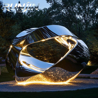 Sculpture d'art moderne en acier inoxydable soudé sur mesure, grande boucle infinie abstraite, creuse, avec éclairage LED, pour extérieur, place publique, parc
