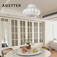 Puerta Plegable de Aluminio Estilo Francés Blanca AOSTTER con Vidrio Templado Transparente y Riel Empotrado para una Elegante Casa de Campo