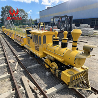 Train touristique sur rail extérieur avec structure solide en fibre de verre et en métal, conception de carrosserie modulaire personnalisée