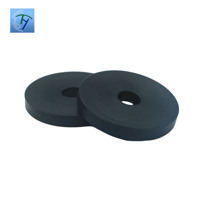 Entretoise ronde en POM noire usinée CNC avec trou central encastré pour pièces d'équipement industriel Fabricant OEM