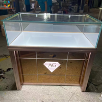Éclairage LED super élevé Offres Spéciales Vitrine de bijoux en verre trempé ultra clair Affichage de montage de haute qualité