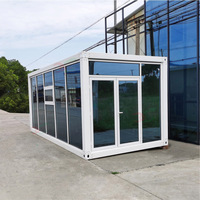 Conteneur préfabriqué détachable Salle d'exposition Petite structure en acier Hall d'exposition Magasin de rue Cabine en verre Sunshine