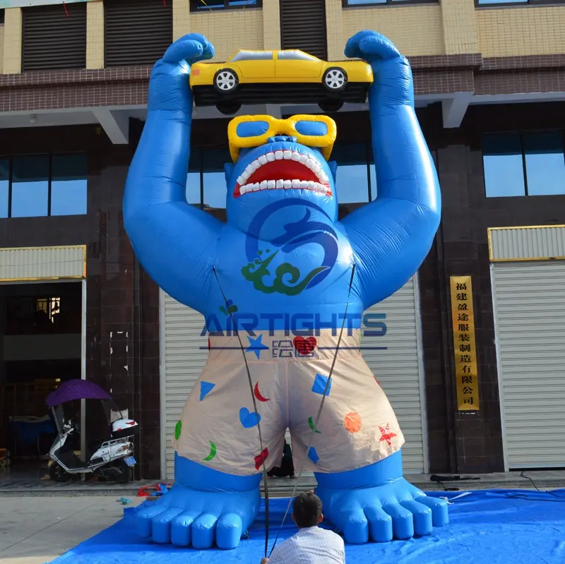 Macaco gigante personalizado publicidade segurando um carro inflável gorila balão para concessionária de carros