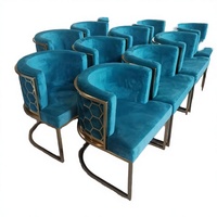 Chaise de salle à manger de luxe en velours bleu confortable avec structure en acier inoxydable et design fauteuil pour la maison, le bureau et la salle à manger