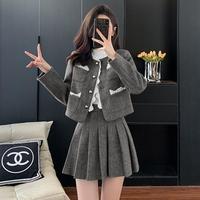 Personnalisé pur polyester décontracté kaki couleur unie automne col rond bouton poche Blazer femmes Mini jupe plissée Tweed ensemble de vêtements