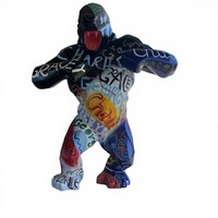 Sculpture en fibre de verre, statue de gorille en résine colorée peinte à la main, adaptée aux centres commerciaux, aux hôtels et à la décoration intérieure