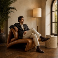 Fauteuil lounge en cuir cognac, capitonné, courbé, moderne, rembourré, pour hall d'hôtel, club, intérieur