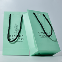 Individuell Bedruckte Mintgrüne Papier-Geschenktasche mit Dickem Baumwollseilgriff Luxuriöse Papiertüte für Kosmetik Wellness Hautpflege Verpackung