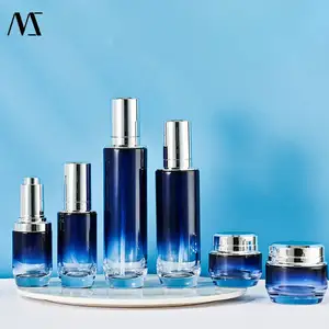 Gradient Blue Glass Bottles With Electroplated Metallic Cap Customized Cosmetic Packaging Set Pump Spray Bottles For Lotion