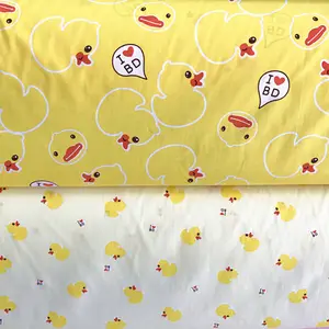 Abbigliamento per bambini tessuto di cotone con stampa anatra gialla