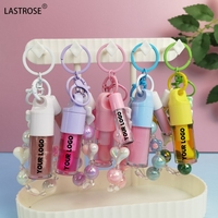 Ensemble de 2 huiles à lèvres hydratantes et brillantes avec porte-clés, vente en gros, marque privée, maquillage végétalien pour les lèvres, tubes grand et mini