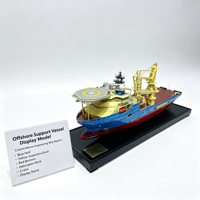 Modèle de navire de soutien offshore personnalisé avec coque bleue, superstructure jaune, fond rouge et pont de grue