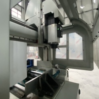 Centre d'usinage CNC robuste OUWO avec changeur d'outils automatique à 6 postes pour l'industrie des fenêtres et des murs rideaux