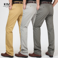 Pantalon de costume décontracté long à taille mi-haute, coupe droite, avec cordon de serrage, couleur kaki, style jean crayon évasé pour homme