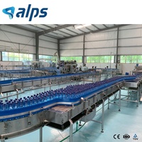 Ligne complète de production entièrement automatique d'eau minérale pure en bouteille en plastique avec équipement d'emballage