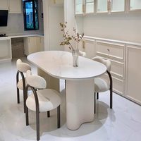 Table à manger ovale en dalle de roche française, petite table à manger moderne minimaliste haut de gamme et combinaison de chaises