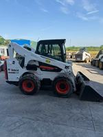 Chargeuse compacte Bobcat d'occasion avec bras de levage vertical, longue portée de déchargement, puissance élevée, faible taux de défaillance