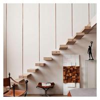 Escalier flottant de luxe léger à marches larges, escalier suspendu spacieux et ouvert pour villas, appartements et hôtels en kit