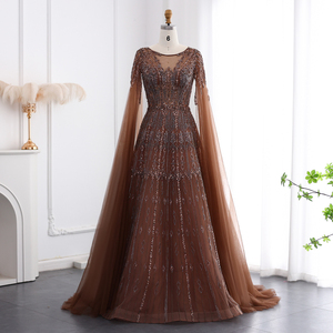 silver evening dress with sleeves Silver Jewel Encrusted Illusion Long Sleeve A Line Gown