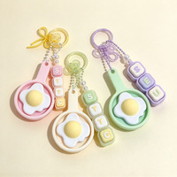 Mainan fidget clicker berbentuk telur goreng 3D dengan tombol tekan dan suara klik, untuk meredakan stres.