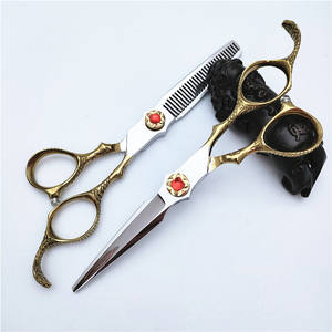 Tijeras de Peluquería Inoue Kazunari de 62 mm, Uso Profesional en Salón de Belleza, para Diestros, Mango Dorado con Gema Roja - Product Image 4