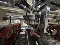 Machine à coudre semi-automatique à double pièce pour la fabrication de cartons