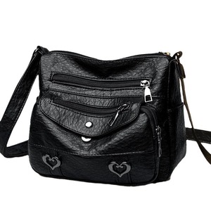 Sac à bandoulière pour femme tendance avec fermeture éclair et chaînes décoratives, grande capacité, en cuir - Product Image 5